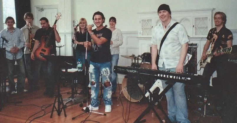 Musicians rehearsing together at Rīgas Privātā Mūzikas Skola in Riga